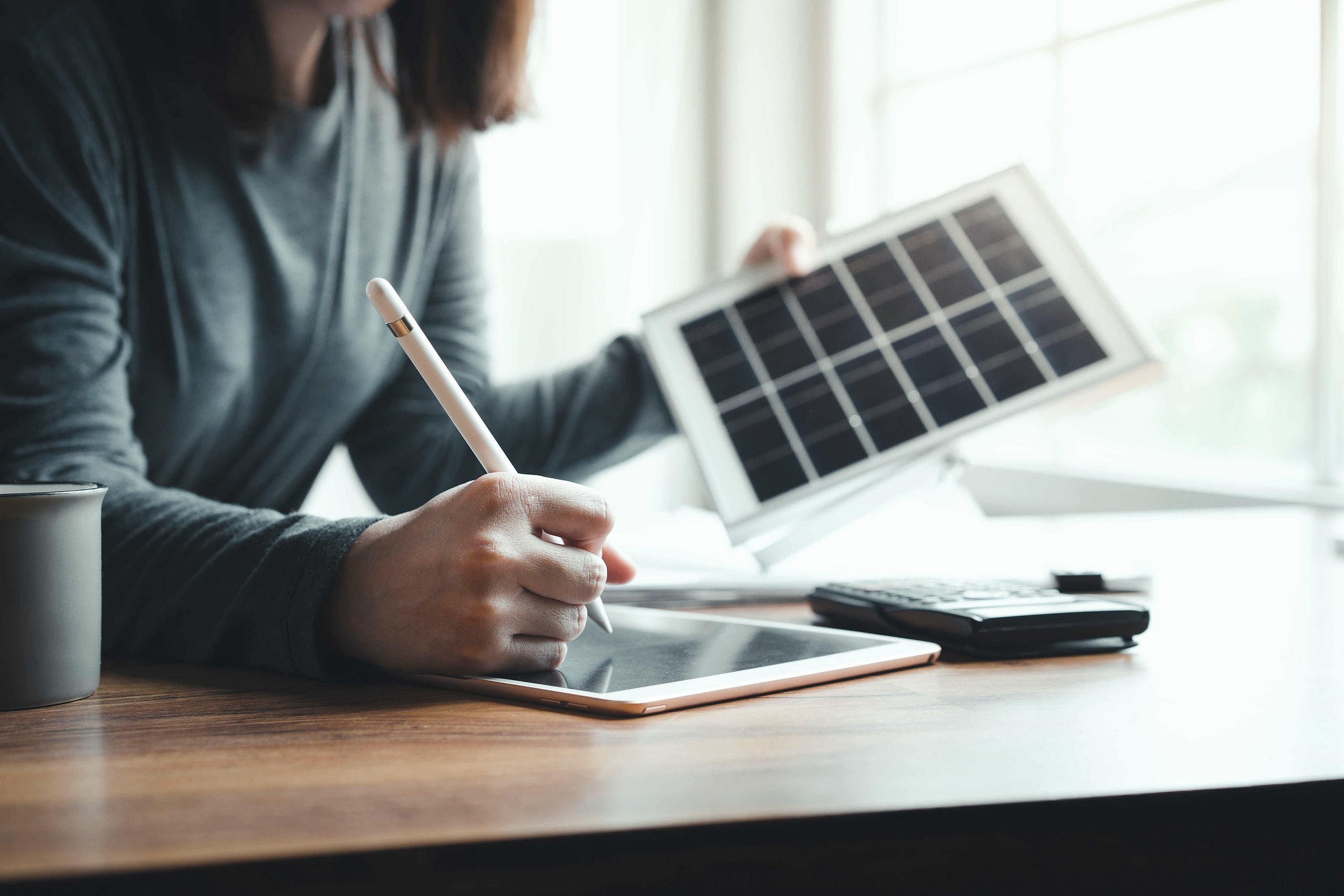 Beautiful,Young,Architect,Working,From,Home,With,Tablet,Checking,Sketches