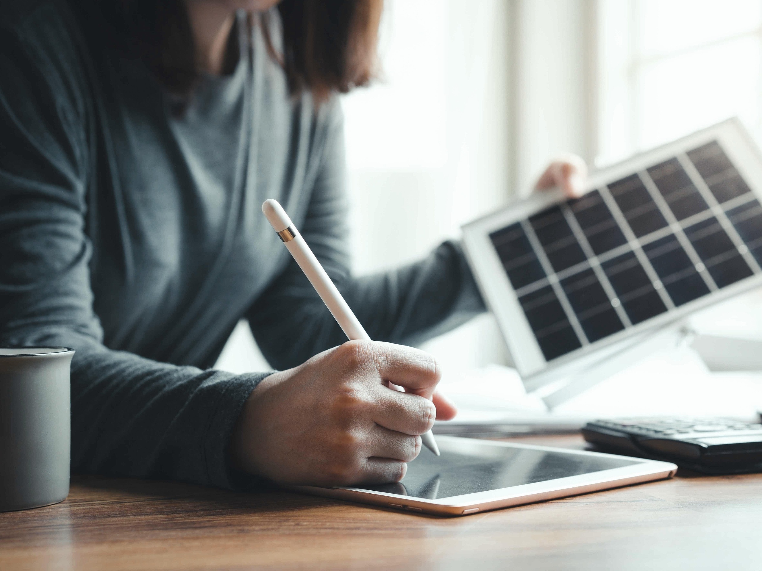 Beautiful,Young,Architect,Working,From,Home,With,Tablet,Checking,Sketches